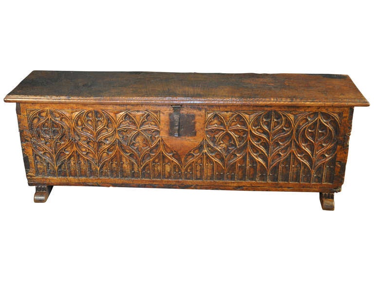 A stunning early 18th century French Coffre or Trunk in Gothic tastes,  constructed from solid planks of walnut and chestnut.  The coffre has a very luminous patina and beautiful grain patterns.  An excellent additional storage option.