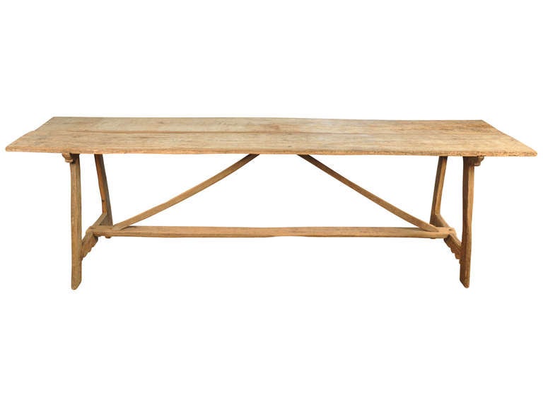 A wonderful 19th century primitive farm or trestle table from the Catalan region of Spain.