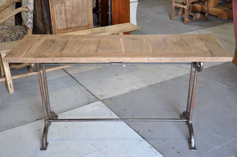 Early 20th century French bistro console table. Iron base circa 1920's, top made of 18th century washed oak.

Keywords: console table, foyer table, sofa table