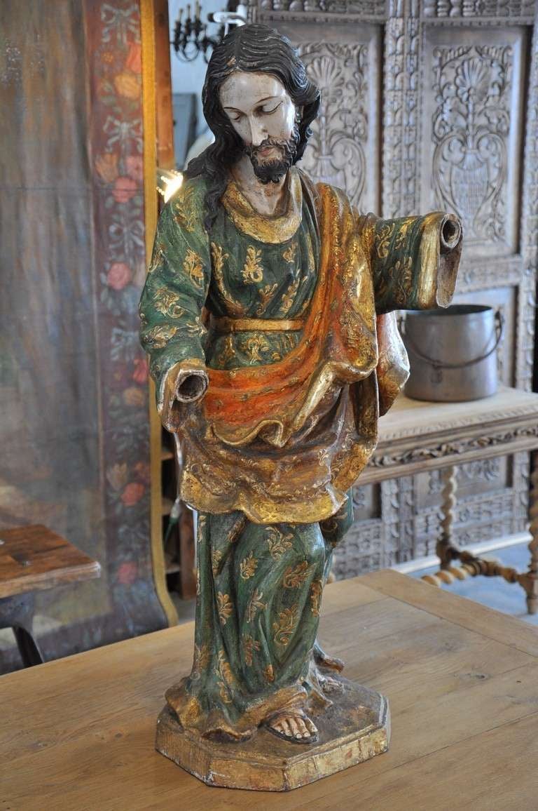 19th century statue of Saint Joseph in polychromed and gilded wood from Spain.

Keywords: religious art, religious sculpture, decorative objects