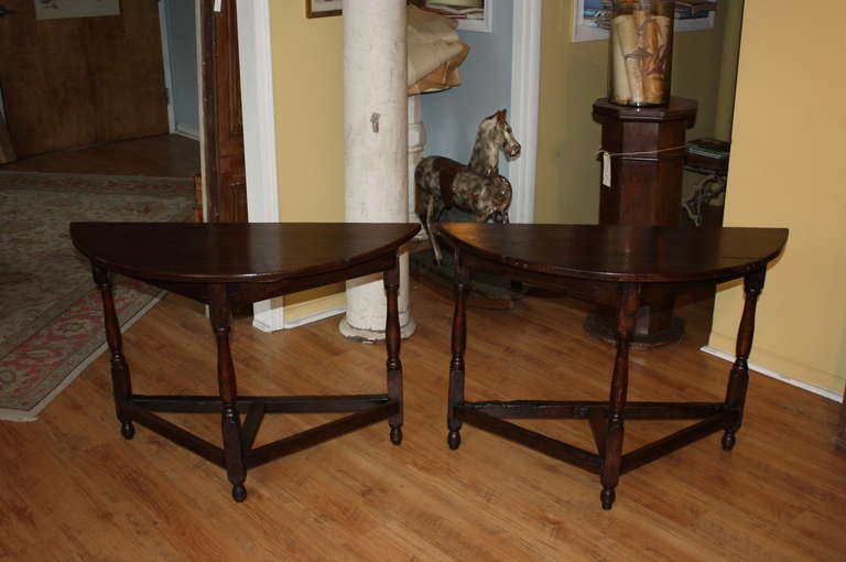 Pair of Demilune consoles transformed from a late 18th century oak gate leg table.