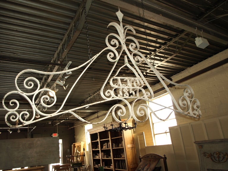 Architectural iron work salvaged from Spanish gate circa 1857. This is a beautiful large scale piece that would be perfect used as a headboard. Would also make a great statement as a garden ornament for a wall with flowers or ivy growing around. The
