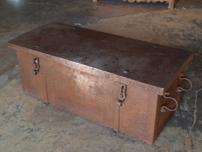 A very handsome French trunk made of wood and clad in iron.  Wonderful at the base of a bed.  Great storage.

