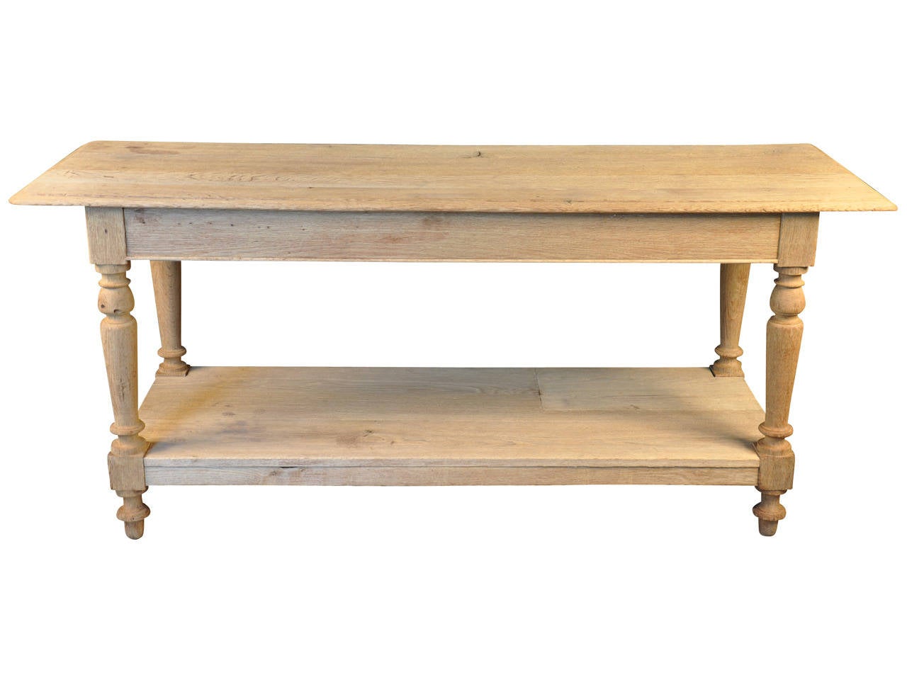 A French late 19th century Draper Table - Work table - in washed oak.  This charming Louis Philippe style piece is very versatile.  Wonderful as a console, sideboard or kitchen island.