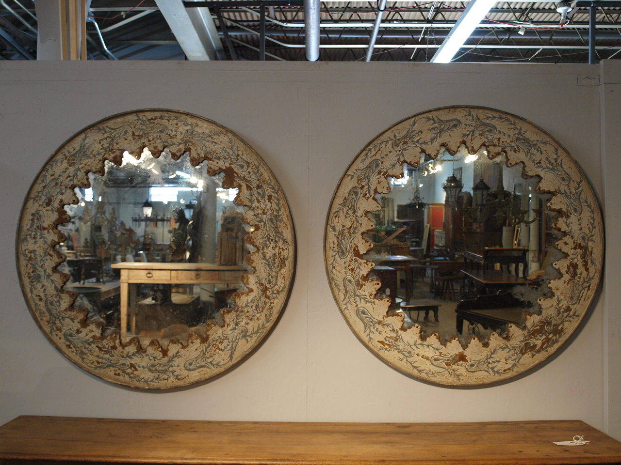 A delightful pair of hand painted metal mirrors from the Catalan region of Spain.  These mirrors are newly constructed from antique elements...  The metal is origining from an old carnival building..  The price for the pair is $4750.  The mirrors
