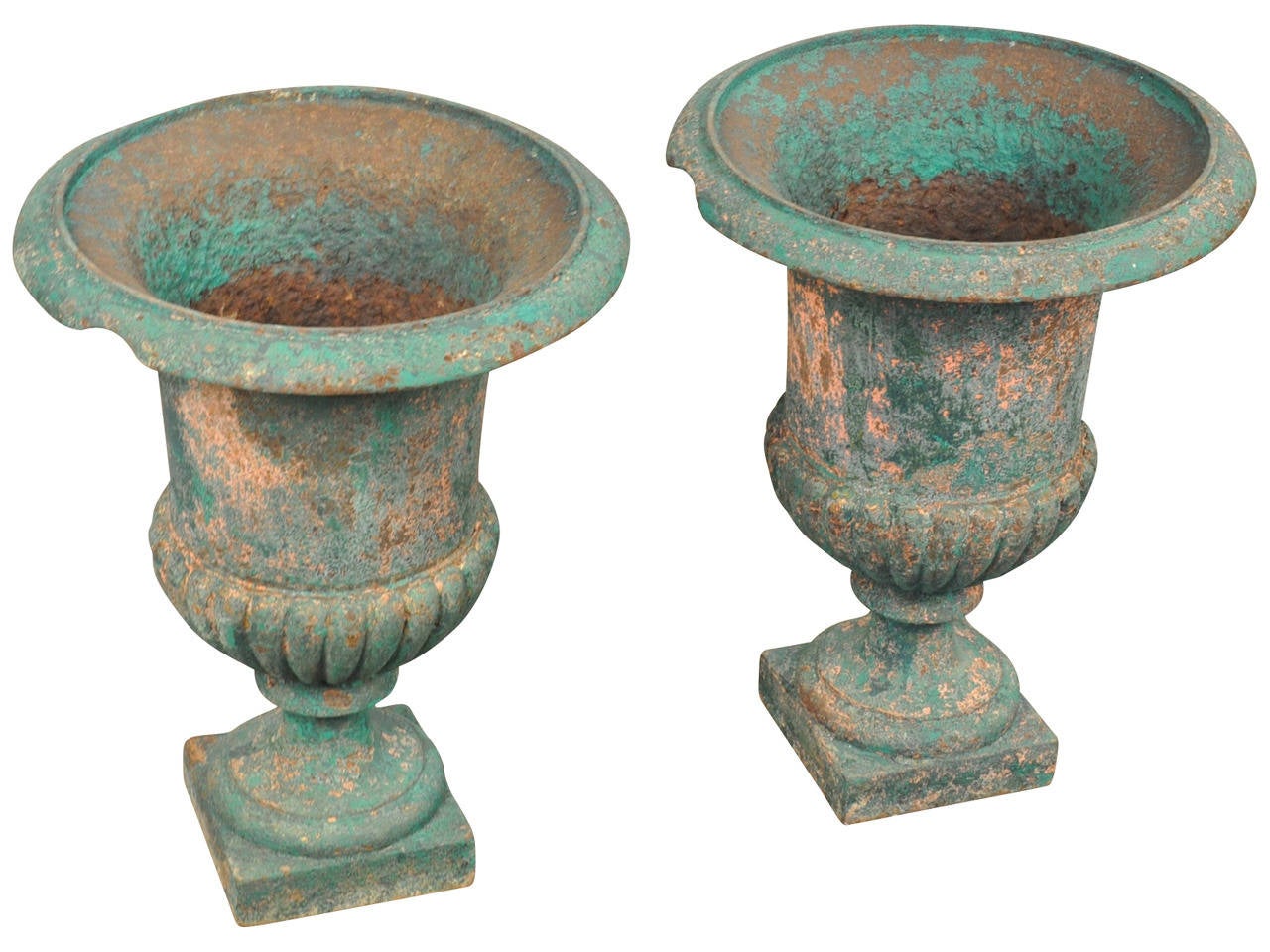 A very handsome pair of late 19th century French painted cast iron urns.  Wonderful indoors or out.  They are also wonderful as bases for occasional talbes, side tables or cocktail tables.
