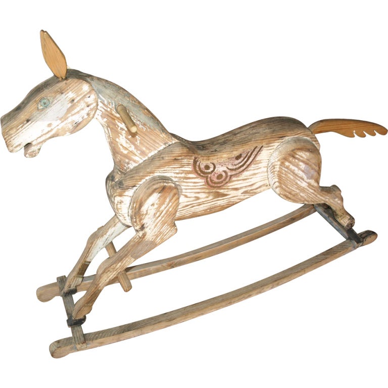 Cheval à bascule en bois peint