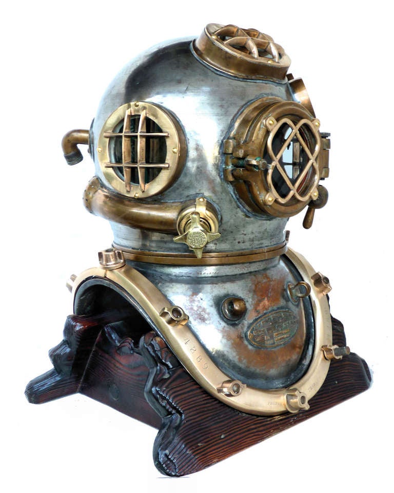 RARE 1942 MORSE NAVY MK V DIVING HELMET NEAR FULLY TINNED

Presented is a very rare, because of its tinning, 12 bolt, 4 light Morse Navy MK V diving helmet that was made in 1942, six months after the attack on Pearl Harbor. Because the helmet has