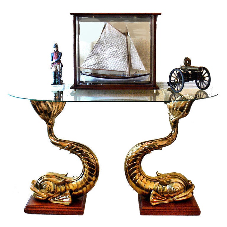 A pair of bronze dolphin statues in the Art Nouveau Style, Ca 1890 -1914 that were in a private collection until recently. They were said to have been removed from the dining salon of a trans-oceanic ship. We had them polished and mounted on a