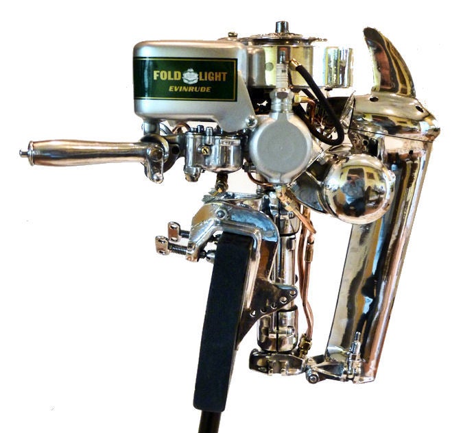 This is an exquisitely restored 1930 Evinrude Fold-Light outboard motor that was made strictly for display for those who appreciate the restoration as a form of industrial art. Hundreds of hours were spent in cleaning, stripping, painting, chroming,