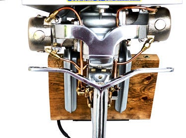 This is the first of Ole Evinrude's light twin outboard motor designs with a rudder. It was was introduced in 1921 and this is a 1923 model made in 1922. Few of these were made so consider this design rare. It s is the design that got Evinrude back