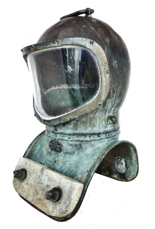This is an authentic Morse No. 15 Shallow Water diving helmet,  made in May, 1951, which comes at the tail end of production of this model. It is in excellent condition considering its age and use with only a few dents and some of the normal marks