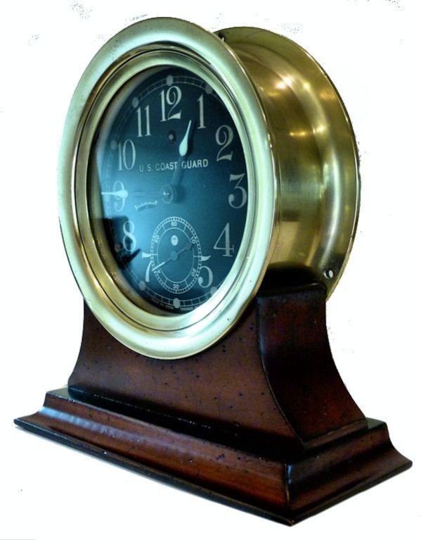 Presented is a collector quality Seth Thomas U.S.Coast Guard Mil-Spec clock that was typically mounted on a bulkhead on a ship's bridge, quarter deck, or in a wardroom. It has a 6 inch black over brass dial with a 5 1/2” viewing area, and heavy
