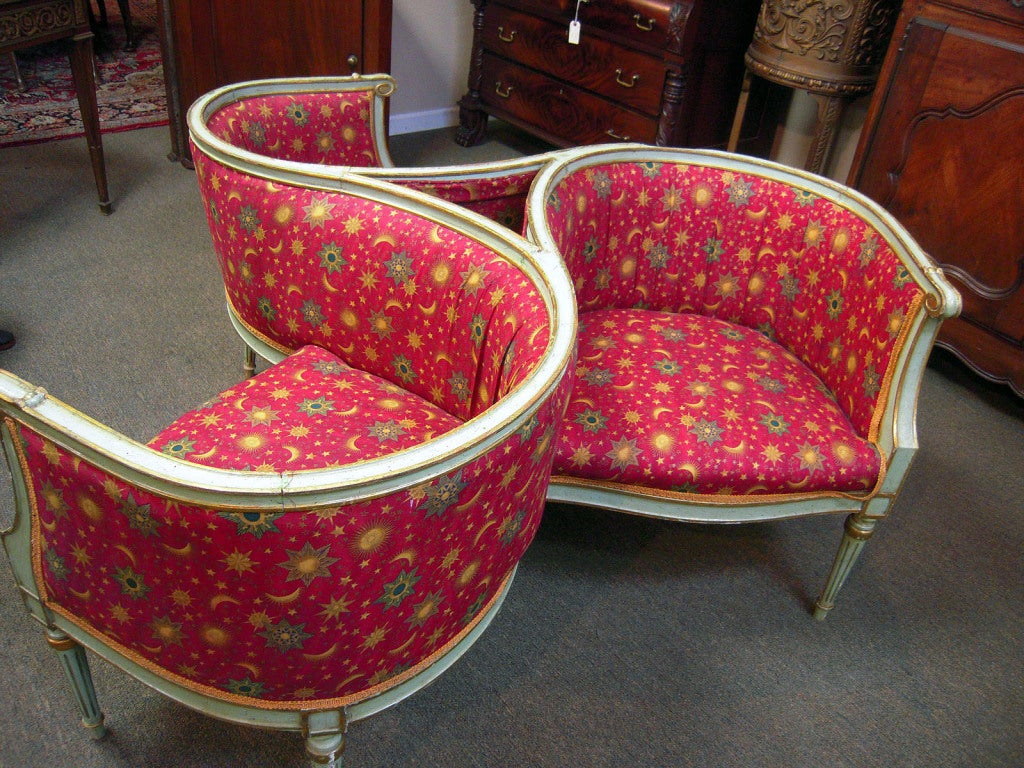 This whimsical 1890s Tete-a-tete features original pale green painted finish with gilt accents, with modern upholstery and trim.
