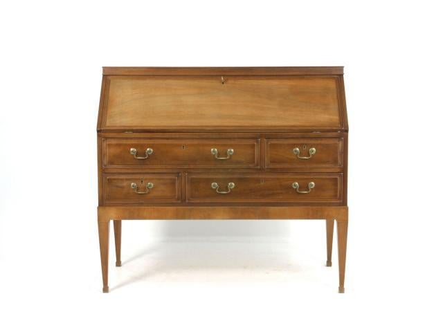 A gorgeous bureau made of Cuban mahogany, is designed and produced by Danish furniture designer and  cabinetmaker Frits Henningsen. This beautiful example of his work exhibits the very highest levels of craftsmanship as well as his pioneering work