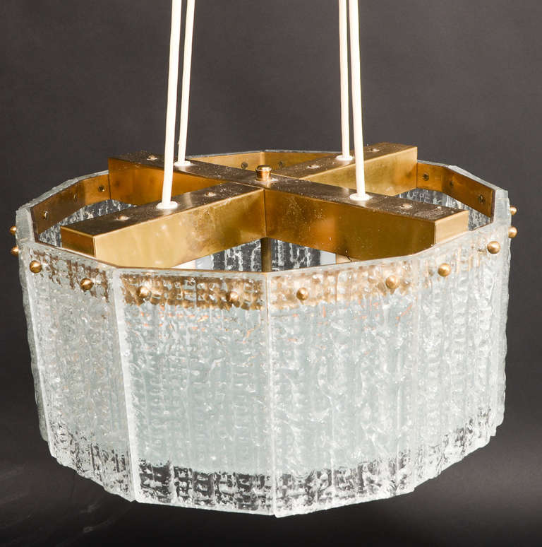 Chandelier Pendant by Carl Fagerlund for Orrefors, circa 1960's Sweden.
Textured glass with brass hardware. Diam. 16