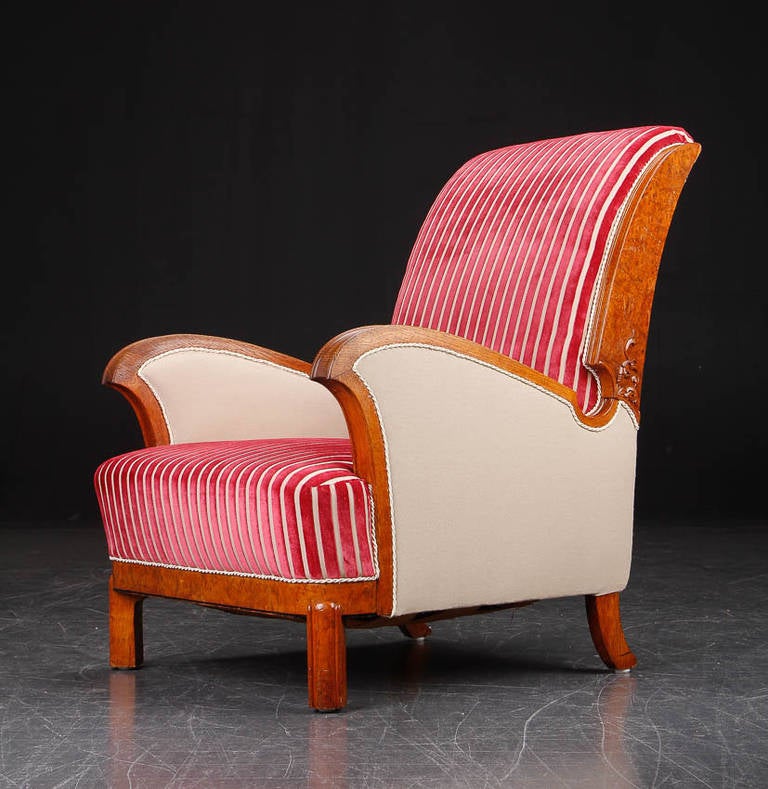 Fantastic Art Deco lounge chair with intricate root wood carvings on side. Whimsical red and white candy stripe velvet on seat and back.