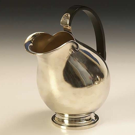 Elegant Danish silver-plated ewer/pitcher from the 1st half of the 20th century. Marked DANA DFA 6223 at the bottom
