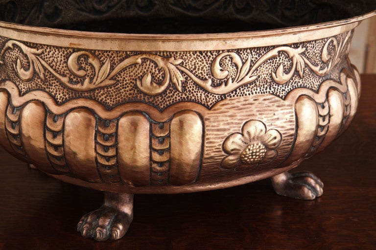 Set upon paw feet, this excellent jardiniere was meant to display fresh flowers and herbs in style, while simultaneously protecting the table or buffet surface.