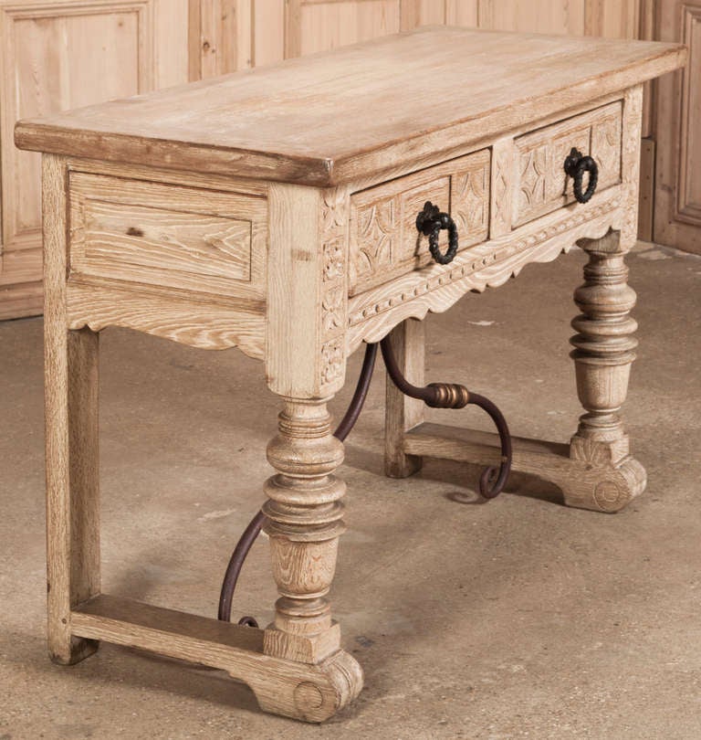 Benchmade from solid stripped and cerused oak to last for generations with a rustic medieval look this Vintage Rustic Spanish Console/Sofa Table makes the perfect choice for an Old World touch! 
Circa early 1900s. 
Measures 35.5H x 55W x 21.5D.
