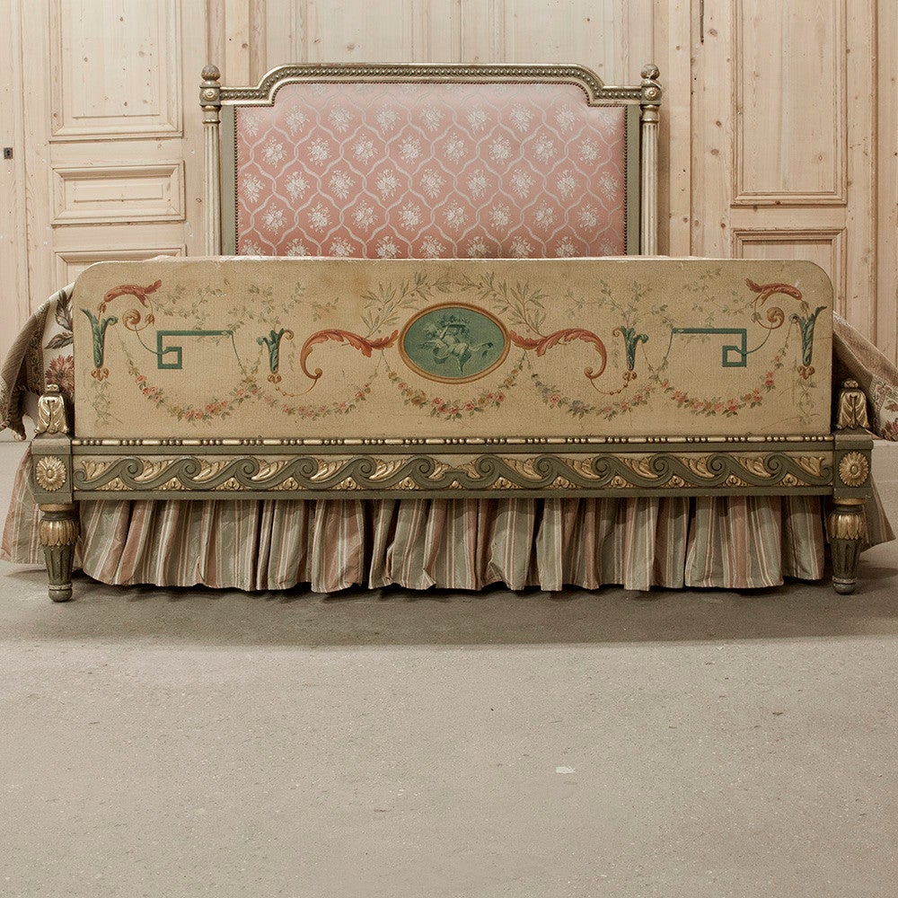 This stunning Louis XVI style bed by David Freres of Marseille boasts its original hand-painted finish all across the footboard and on every member of its construction. Greek wave lines the rails and bottom of the footboard, with intricate molded