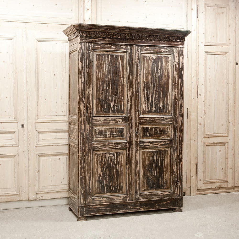 The Swedes have long been known for their no-nonsense, practical furnishings and indeed even today the Swedish modern look is still popular in some circles. This Gustavian armoire reflects that characteristic, with tailored architecture enhanced