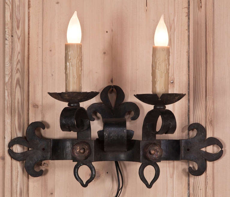 Pair of Country French Wrought Iron Hand Forged Sconces In Excellent Condition In Dallas, TX