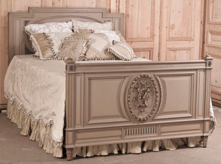 Featuring classical architecture and its original painted finish, this stately Antique French Louis XVI Painted Queen Bed will provides timeless style with 21st century comfort! 
Circa 1890s.
Headboard 53H x 62W / Footboard 37.5H x 62 / length 86