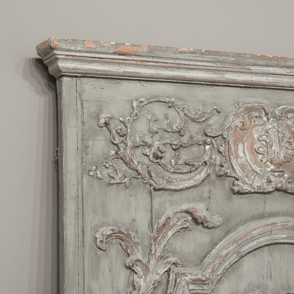 This stunning 18th century country French painted trumeau features a patinated painted finish that is perfect for the 