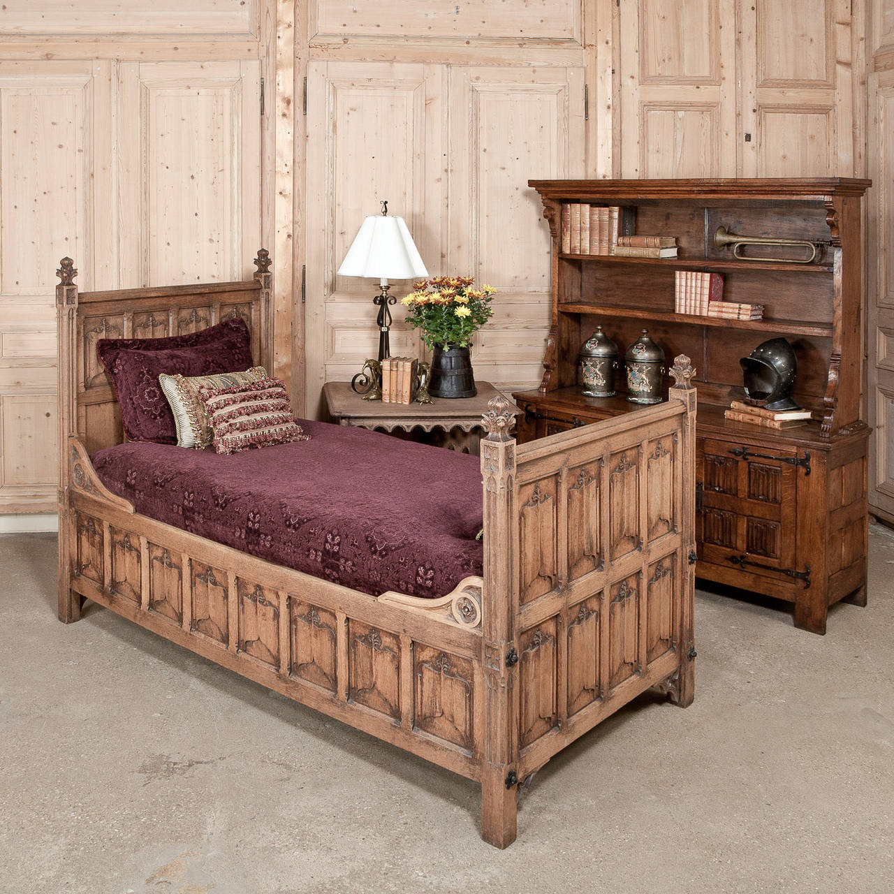 This amazing interpretation of the French Gothic style has the most linenfold panels of any piece we've ever seen! Carved on the inside and outside of all four sides of this amazing bed with the Gothic motif, it features high rails making it the