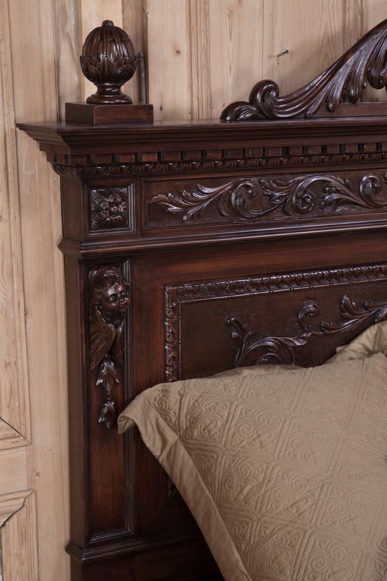 Sculpted from fine Italian walnut by talented artisans, this bed will create a focal point in the room due to its majestic Renaissance-inspired carved sculture and adornment. From the elaborately carved crown flanked by carved orb finials to the