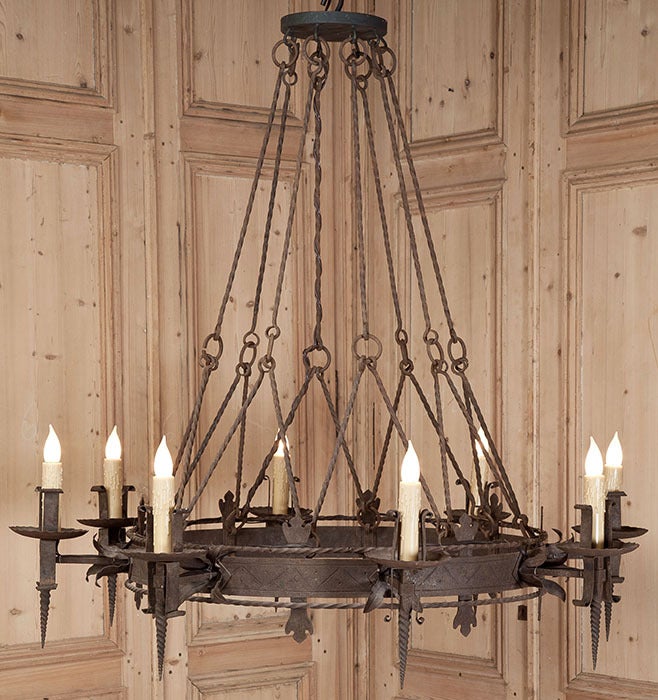 Crafted on a grand scale for an imposing villa near Pisa, this impressive chandelier was hand-forged from red-hot iron in the Gothic style to create a superlative medieval look for your favorite room. Twisted rods join together to create the support