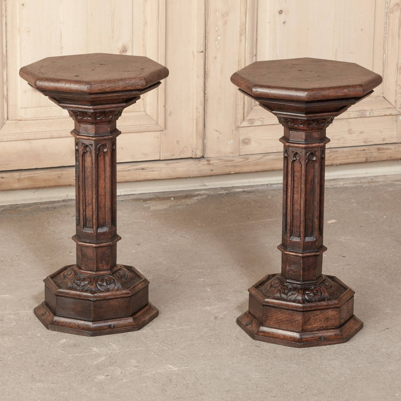 This pair of Gothic style pedestals are perfect for a low display, a riser, or to hold a lamp. handcrafted from solid oak, each was built to last for centuries!
circa 1880.
Measures: 23.5 H x 12 W x 12 D.

Inessa Stewart's Antiques, a