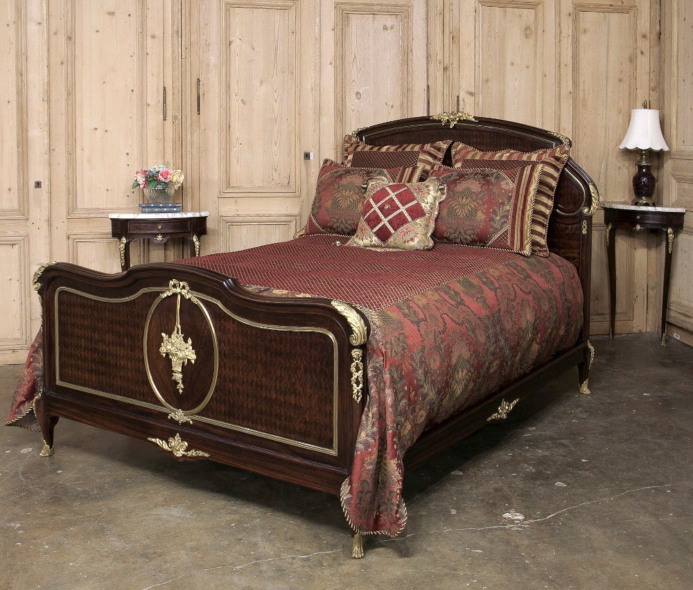 This magnificent 19th century neoclassical mahogany marquetry bedroom suite was crafted with the utmost quality from the finest materials ~ exotic imported mahogany, hand-beveled glass and cast bronze gilt ormolu mounts, called bronze doré in