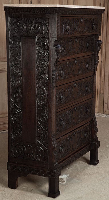 Sculpted from dense, old-growth French white oak to last for centuries, then topped with marble for a carefree yet elegant surface, this handsome chiffoniere or chest of drawers was crafted on a grand scale to embellish a lovely manoir, and it's now