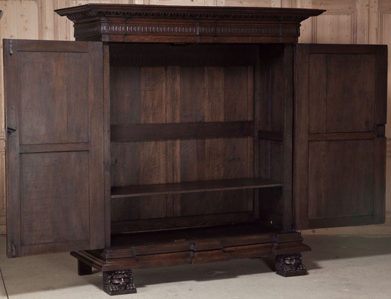 Designed to be a work of art that would immediately become the focal point of any room, this stunning armoire is in a truly remarkable state of preservation! Hand-sculpted by Dutch masters, it features the singular style that was common during the
