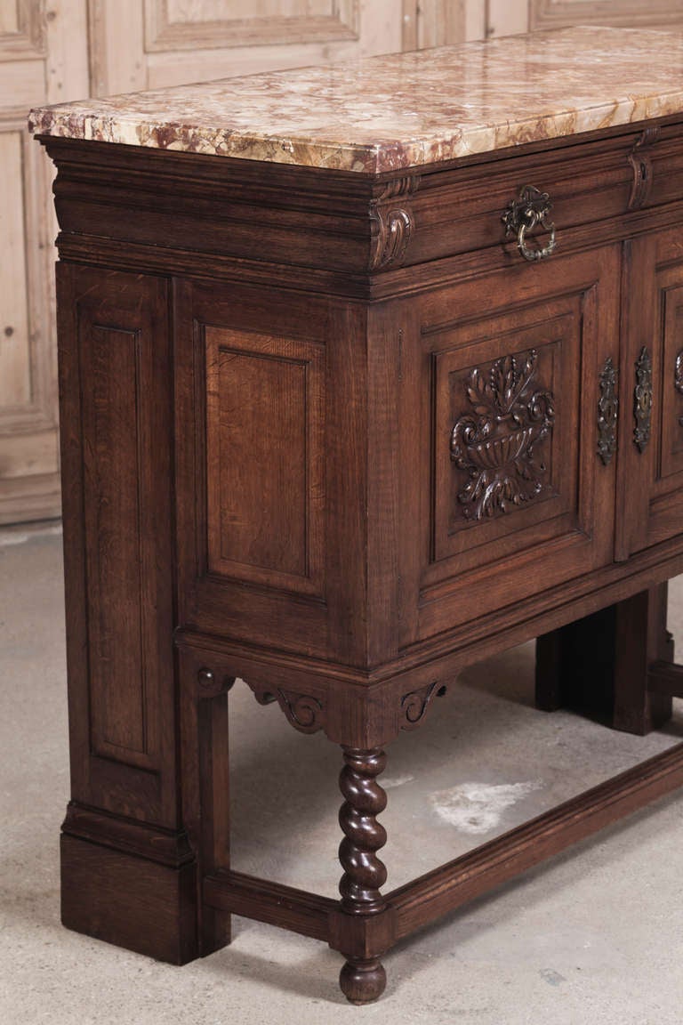 The tailored lines of this Henri II-inspired dessert buffet are subtly enhanced by relief carvings and corbels, all accenting the linear architecture. Fine molded detail pervades the entire faade, perfect for supporting the lavish earth tones of the