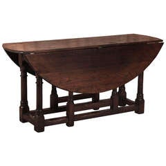 Antique table ovale à abattant Gateleg