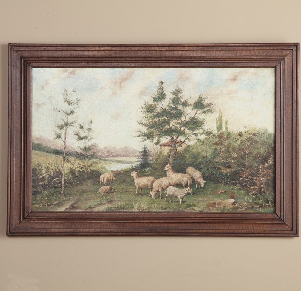 This wonderful pastoral work features a simplistic frame making it an ideal choice for a casual decor.  The artist, H. Basteyns, has used a considerable talent to showcase the flock of sheep in the foreground with a wide variety of lush foliage