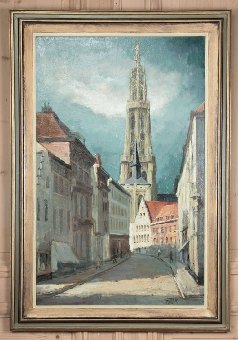 Vintage Framed Oil Painting on Canvas by Willem Grasle depicts the streets of Antwerp with the cathedral spire in the background.
The artist enjoyed quite the career, studying under such greats as Isidore Opsomer, and was himself a teacher at the