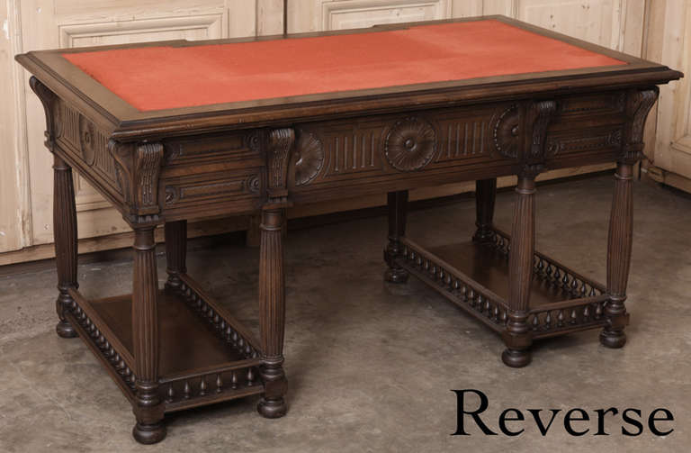 Handsome bench-made from fine French walnut, this 19th century French Henri II Desk features an airy look yet with the convenient drawers and shelves is capable of surprising storage in style!  A new hand-tooled leather writing surface can been