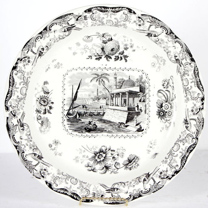 Antique black transferware charger features an elaborate motif entitled 