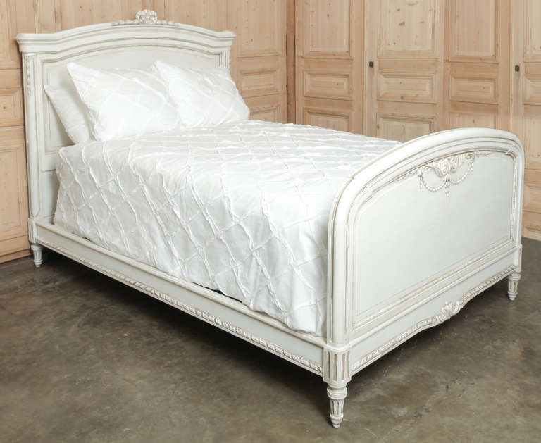 Classic styling and solid oak construction make this the perfect choice as a family keepsake to hand down to the next generation!  The Louis XVI style has been revealed via carved embellishments on the subtly arched headboard and footboard crowns,