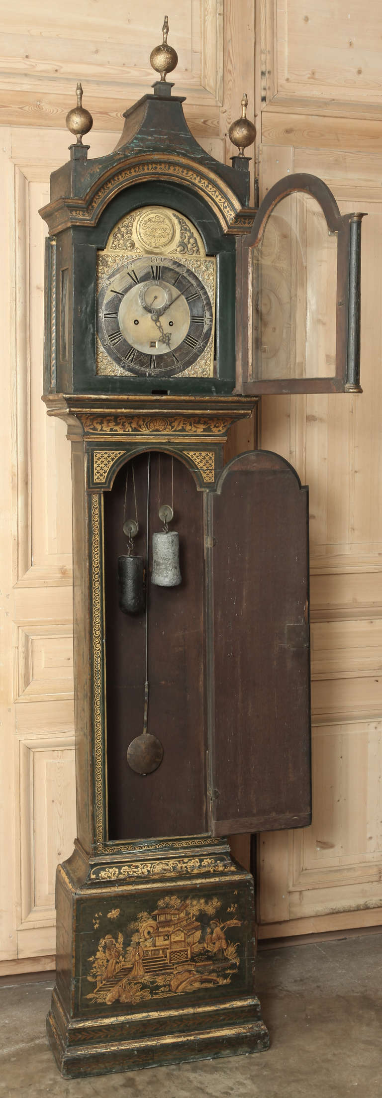 This wonderful 18th century Chinoiserie-Decorated Long Case Clock by Joseph Herring of London features the hood with pagoda top with turned ball finials, the trunk fitted a long trunk door with arch topped door, a case with gold Chinoiserie