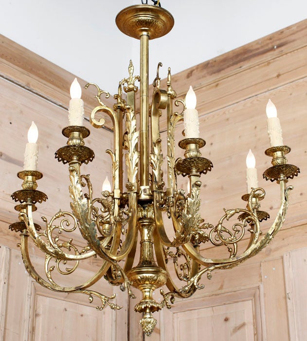 Possessing an elegance that can only be found in the finest of the 19th century French bronze chandeliers, this exceptional example abounds in detail that modern metalsmiths can only admire, never duplicate. Fashioned in France in late 1800s from