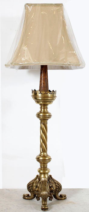 Exquisite detail in the Gothic manner has been rendered in solid bronze with spiral brass central shaft to produce this altar candlestick, which has been converted to UL Standard electric lighting by our expert in-house staff. Hand-sewn silk shade