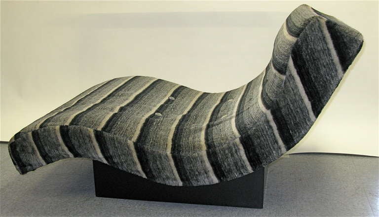 Great Pearsall piece.The lounge has a wood base frame. The chair needs some new fabric....