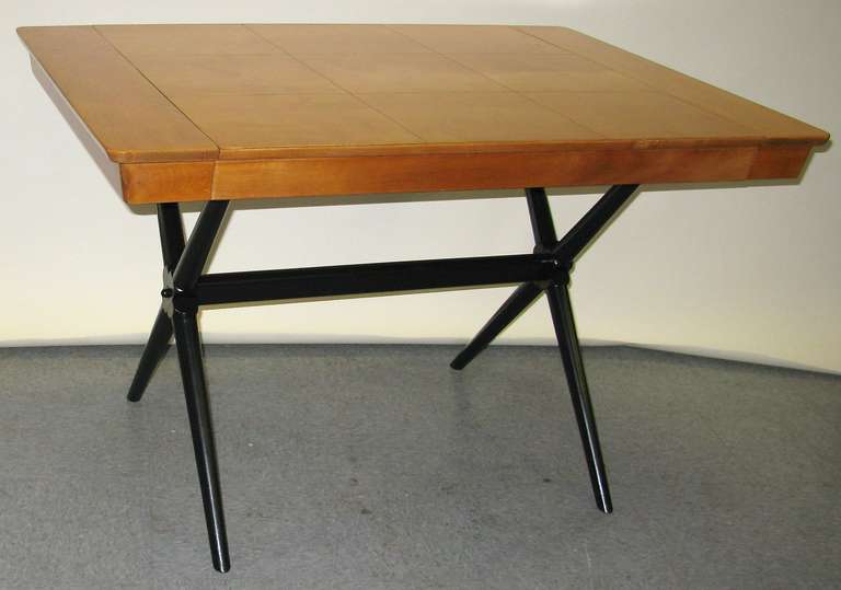 Natural color birch top. Has 2- 10 inch leaves. Black lacquer base.