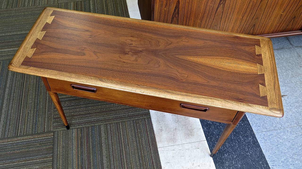 Restored. Labeled. Great design on top. Nice versatile piece!