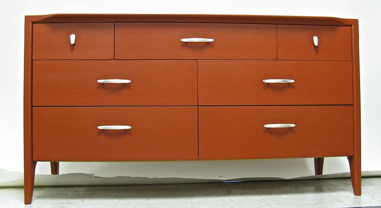 Flat finish. Nickel-plated handles.7 drawers. Some minor rough areas under paint.